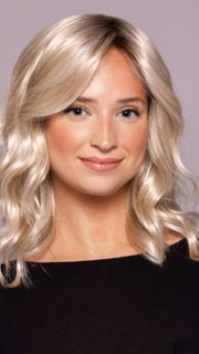 Model is wearing AERI by ESTETICA in color SUNLIT-BLONDE | Soft Blend of Sandy Blonde, Lightest Blonde and Iced Blonde with a Light Golden Brown Root