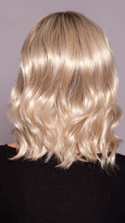 Model is wearing AERI by ESTETICA in color SUNLIT-BLONDE | Soft Blend of Sandy Blonde, Lightest Blonde and Iced Blonde with a Light Golden Brown Root