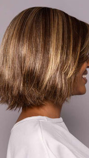 Model is wearing LUMI by ESTETICA in color CKISSRT4 | Golden Brown with Copper Blonde Highlights and Dark Brown Roots