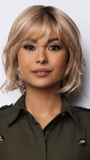 Model is wearing BRANN in SANDY BEIGE BLONDE R | Carefully placed shades of dark sandy blonde and light neutral blonde with medium root tone for added depth.         