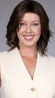 Model wearing CYRUS in color HAVANA BROWN R | A rich, medium neutral brown with minimal warm tones, offering a natural, sophisticated look. Softly rooted for added depth.