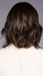 Model wearing CYRUS in color HAVANA BROWN R | A rich, medium neutral brown with minimal warm tones, offering a natural, sophisticated look. Softly rooted for added depth.
