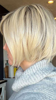Carly N. @carlynwilson84 wearing Smooth Cut Bob by TressAllure in color 613/1001/R18 | Vanilla Blonde Platinum White Blend Rooted Ash Brown