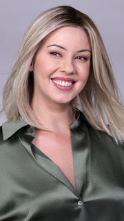 Model is wearing CHELSEA by BELLETRESS in CRUSHED-ALMOND-BLONDE-R | A soft Neutral Light Blonde with a Light and Medium Blended Root Color