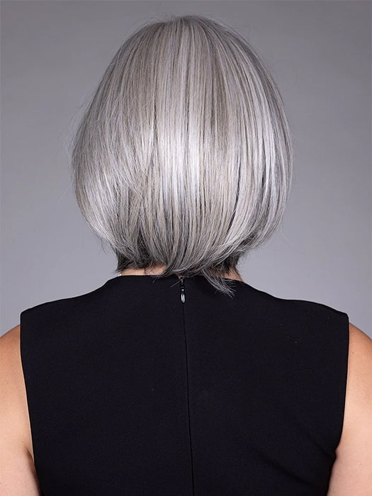 Model is wearing DION in color COCANUT MILK GREY R | Creamy, off-white tones with soft gray hues, creating a pearlescent or silvery finish.