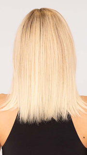 Roxie wearing NUANCE by ELLEN WILLE in color CHAMPAGNE ROOTED 22.16.26 | Light Neutral Blonde and Medium Blonde with Light Golden Blonde Blend and Shaded Roots