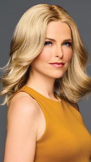 Model is wearing GL14-22SS | SS SANDY BLONDE | Dark golden blonde base blends into multi-dimensional tones of medium gold blonde and light beige blonde. 