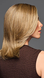 Model is wearing OWN THE ROOM LUXURY in color GF12-22 SS CAPPUCCINO | Light Golden Brown Evenly Blended with Cool Platinum Blonde Highlights with Dark Roots