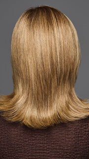 Model is wearing OWN THE ROOM LUXURY in color GF12-22 SS CAPPUCCINO | Light Golden Brown Evenly Blended with Cool Platinum Blonde Highlights with Dark Roots