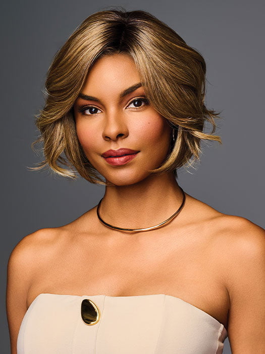 Model is wearing TREND ALERT LUXURY in color GF11-25 SS HONEY PECAN | Chestnut Brown base blends into multi-dimensional tones of Brown and Golden Blonde