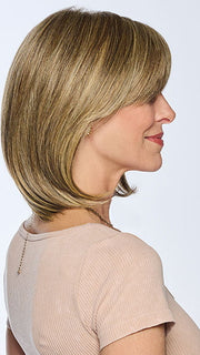 Model is wearing AMBITIOUSLY BEAUTIFUL in BROWN-BLONDE | Medium to Light Brown with salon highlights
