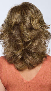 Model is wearing Fierce & Free in BROWN-BLONDE | BROWN-BLONDE | Medium to Light Brown with salon highlights