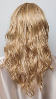 Model is wearing HANA by NORIKO in color Light Ash Blond R | Cream Ash Blonde with ash brown and white-grey roots that blend into a variety of ash blonde tones, including ash pearl blonde, creamy ivory, and pale cream