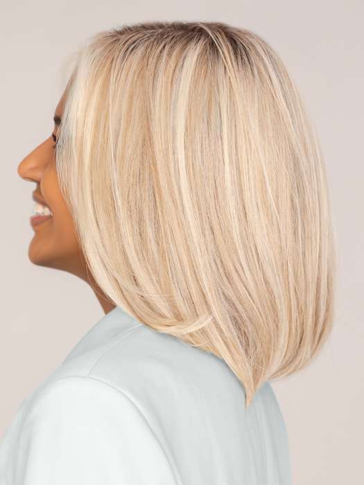 Model is wearing HAUTE by JON RENAU in color 101/88/27S8 CATALINA BLONDE | Pale blonde with Pure White Natural Violet halo highlights, shaded medium brown