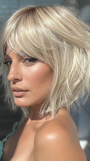 Model is wearing HOLLIS by ESTETICA in color SUNLIT-BLONDE | Soft Blend of Sandy Blonde, Lightest Blonde and Iced Blonde with a Light Golden Brown Root
