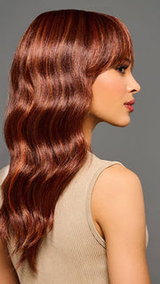 Model is wearing KALIYAH in color MC30/130SS CHERRY COLA | Dark Red with Copper Highlights