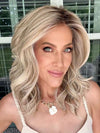Kristyna Moore @kristynamoore wearing LAGUNA BEACH by BELLETRESS in  MILKSHAKE BLONDE R | A mixture of Light Sandy Brown, Highlighted with Light Ash Blonde with a Hint of Light Platinum Blonde with a Medium Root Color