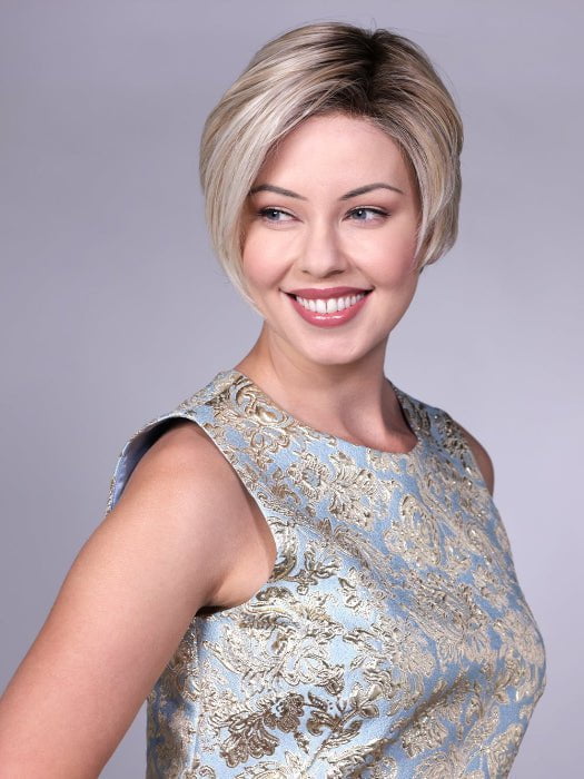 Model is wearing LENOX By BELLETRESS in CRUSHED-ALMOND-BLONDE-R | A Soft Neutral Light Blonde with a Light and Medium Blended Root Color