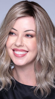 This beautiful "lob" has uniform length and soft waves that barely sweeps the shoulders