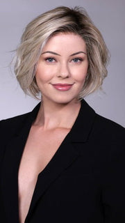 Model is wearing CRUSHED ALMOND BLONDE R | A soft Neutral Light Blonde with a Light and Medium Blended Root Color.