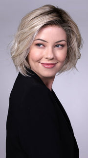 Model is wearing CRUSHED ALMOND BLONDE R | A soft Neutral Light Blonde with a Light and Medium Blended Root Color