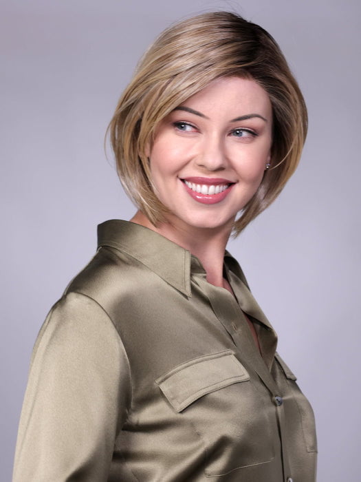 Model is wearing MANCHESTER in RAW SUGAR BLONDE | A Neutral Light Blonde, Honey Blonde, Pale Gold Blonde, with a base of Light Brown Low Lights featuring a Medium Root Color