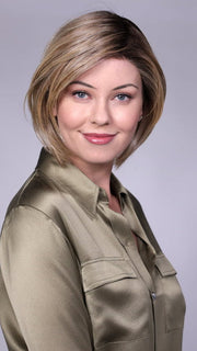 Model is wearing MANCHESTER in RAW SUGAR BLONDE | A Neutral Light Blonde, Honey Blonde, Pale Gold Blonde, with a base of Light Brown Low Lights featuring a Medium Root Color