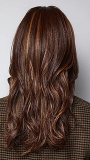 Model is wearing MARGO in color GLAZED AUBURN R | Stunning fusion of deep red, medium copper, and dark chocolate root.