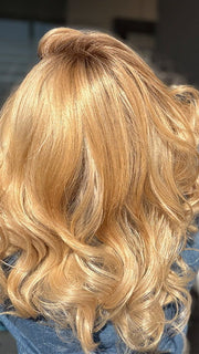 Roxie is wearing the MILLION DOLLAR BABE by TRESSALLURE in color 24/102/R12 | Gold Blonde with Platinum highlights with Gold Brown roots