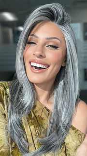 Model is wearing MIRROR MOMENT by GABOR in color GF44-60SS SUGARED LICORICE | Salt Dark Brown with Subtle Warm Highlights Roots