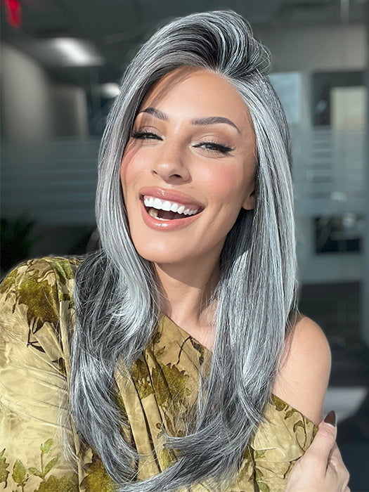 Model is wearing MIRROR MOMENT by GABOR in color GF44-60SS SUGARED LICORICE | Salt Dark Brown with Subtle Warm Highlights Roots