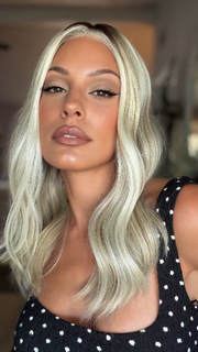 Roxie is wearing MORGAN by JON RENAU in 101/88/27S8 CATALINA BLONDE | Pale blonde with Pure White Natural Violet halo highlights, shaded medium brown