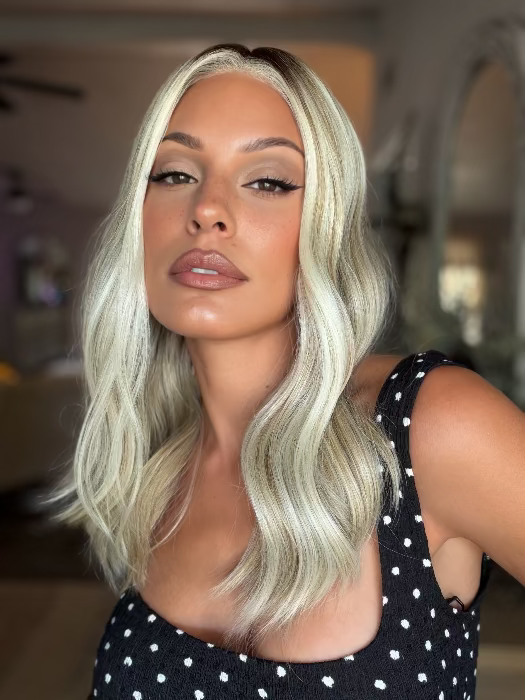 Roxie is wearing MORGAN by JON RENAU in 101/88/27S8 CATALINA BLONDE | Pale blonde with Pure White Natural Violet halo highlights, shaded medium brown