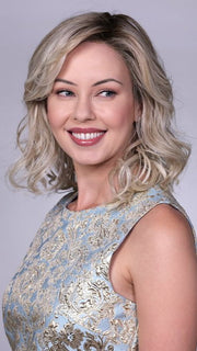 Model is wearing MORGAN By BELLETRESS in CRUSHED-ALMOND-BLONDE-R | A Soft Neutral Light Blonde with a Light and Medium Blended Root Color