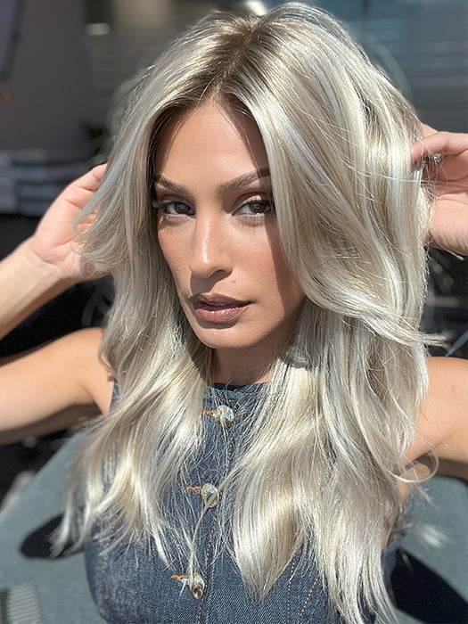 Model is wearing OLIVIA by JON RENAU in color FS17/101S18 PALM SPRINGS BLONDE | Light Ash Blonde with Pure White Natural Violet Bold Highlights, Shaded with Dark Natural Ash Blonde