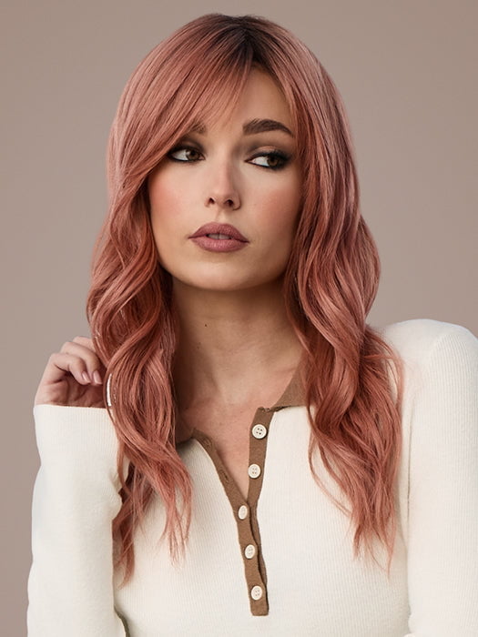 Model is wearing POSH WAVEZ in DUSTY ROSE | Medium Coral Red Base with Dark Brown Roots