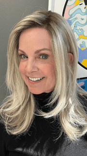 Susan Sparks @sparkles_intheworld wearing MIRANDA by JON RENAU in color FS17/101S18 PALM SPRINGS BLONDE | Light Ash Blonde with Pure White Natural Violet, Shaded with Dark Natural Ash Blonde