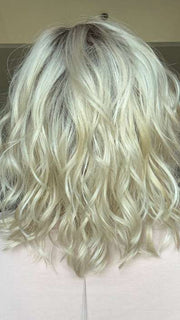 Brea @getwiggywithbrea wearing ARLO by ESTETICA in color SUNLIT-BLONDE | Soft Blend of Sandy Blonde, Lightest Blonde and Iced Blonde with a Light Golden Brown Root
