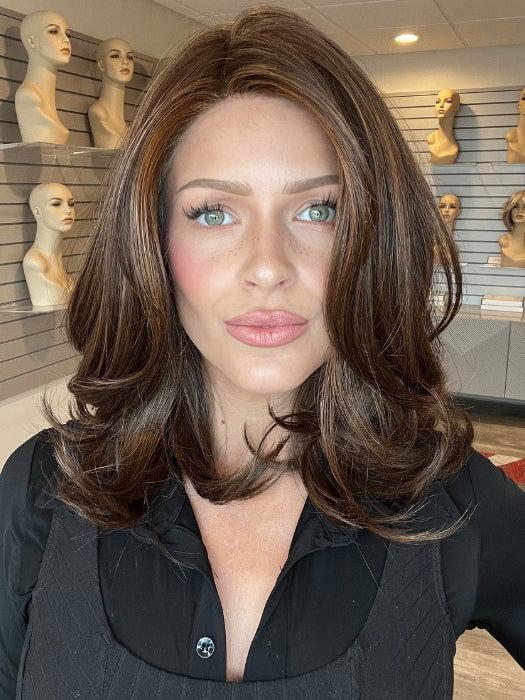 Madeline is wearing SHOWRUNNER by RAQUEL WELCH in RL6/30 COPPER MAHOGANY | Medium Brown Evenly Blended with Medium Auburn