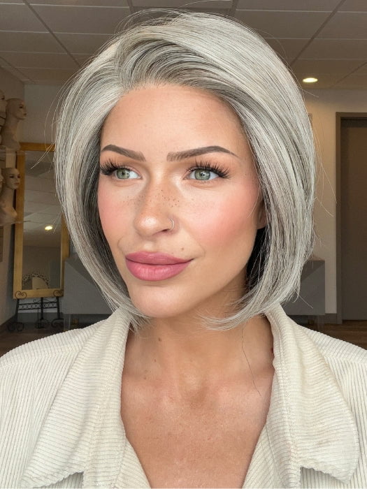 Madeline is wearing STRAIGHT UP WITH A TWIST ELITE by RAQUEL WELCH in RL119 SILVER AND SMOKE | Light Brown with 80% Gray in Front Gradually into 50% Gray Towards the Nape