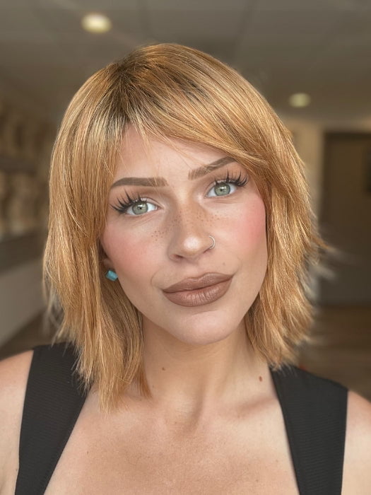 Madeline is wearing JONES by ESTETICA in MANDARIN-ROOTED | Light Auburn and Strawberry Blonde Blend with Golden Brown Roots