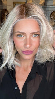 Madeline wearing MIRA by AMORE in MILKY-OPAL | A Blend of Creamy Blonde and White Blonde Rooted with Warm Brown