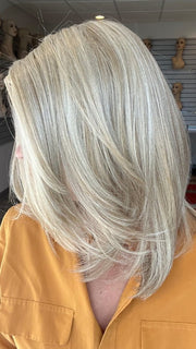 Madeline is wearing OWN THE ROOM by GABOR in GF19-23 BISCUIT | Light Ash Blonde Evenly Blended with Cool Platinum Blonde