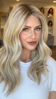 Madeline is wearing SELFIE MODE by RAQUEL WELCH in RL19/23SS SHADED BISCUIT | Light Ash Blonde Evenly Blended with Cool Platinum Blonde with Dark Roots