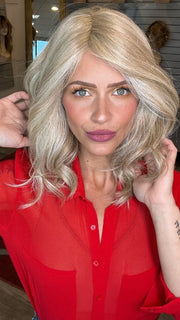Madeline wearing BELLA VIDA BY RAQUEL WELCH in RL19/23 BISCUIT | Light Ash Blonde Evenly Blended with Cool Platinum Blonde