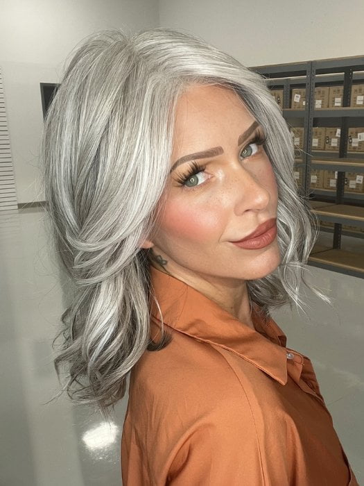 Madeline wearing BRADSHAW by BELLETRESS in COCONUT MILK GRAY | A soft, modern blend of creamy off-white and gentle gray tones, creating a pearlescent, silvery finish.