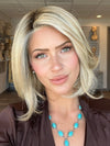 Madeline is wearing UPSTAGE by RAQUEL WELCH WIGS in color RL19/23SS SHADED BISCUIT | Light Ash Blonde Evenly Blended with Cool Platinum Blonde with Dark Roots 