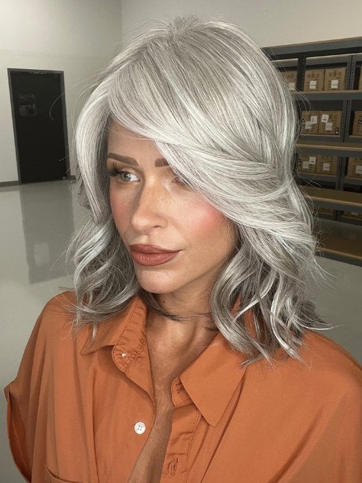 Madeline wearing BRADSHAW by BELLETRESS in COCONUT MILK GRAY | A soft, modern blend of creamy off-white and gentle gray tones, creating a pearlescent, silvery finish.