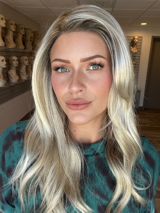Madeline is wearing OLIVIA by JON RENAU in color FS17/101S18 PALM SPRINGS BLONDE | Light Ash Blonde with Pure White Natural Violet Bold Highlights, Shaded with Dark Natural Ash Blonde