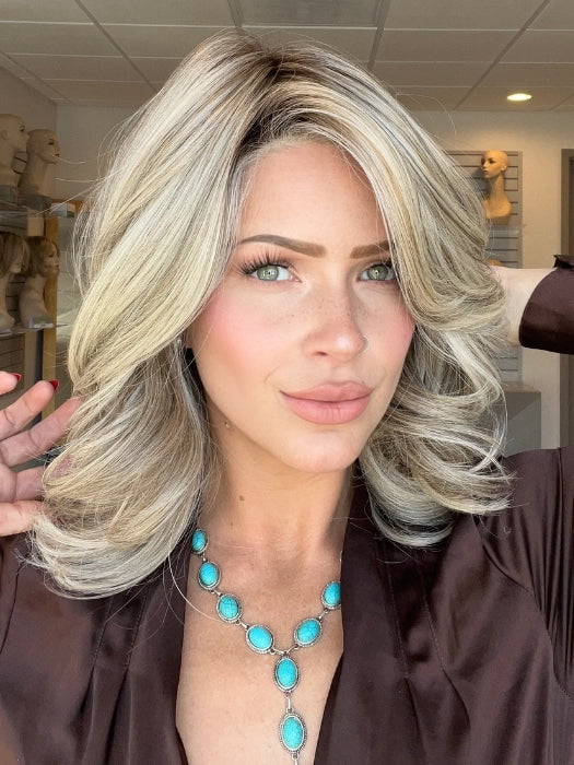 Madeline is wearing FLIP THE SCRIPT by RAQUEL WELCH in RL17/23SS ICED LATTE MACCHIATO | Honey Blonde shaded with Cool Blonde